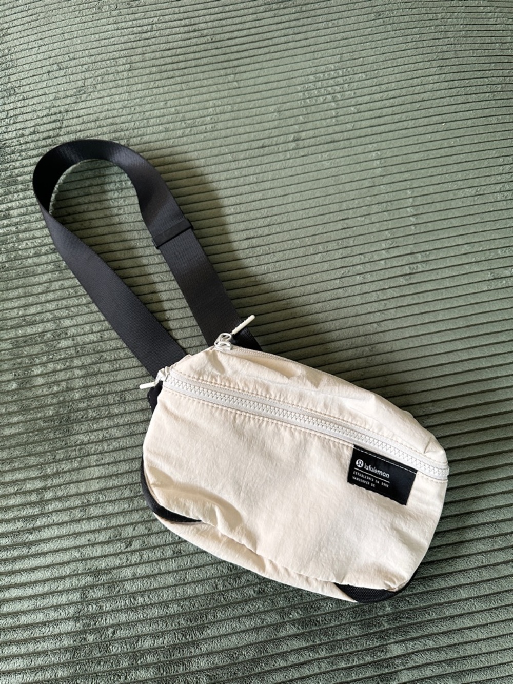 lululemon athletica Cream Sling Belt Bag with Black Strap